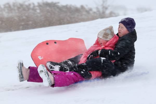 Photos: Saturday snow, fun for some, headache for others in northern Illinois