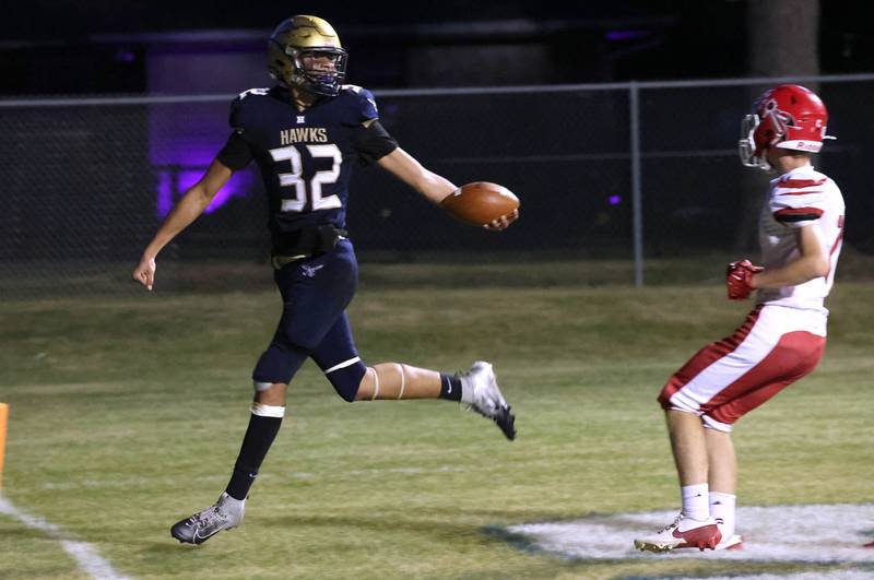Hiawatha's Jayden Gray celebrates after hauling in a touchdown pass behind the South Beloit defense during their game Friday, Sept. 20, 2024, at Hiawatha High School in Kirkland.