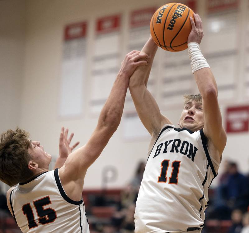 Byron’s Cason Newton hauls down a rebound against Newman Friday, Dec. 19, 2025, in the Forreston Holiday Tournament title game.