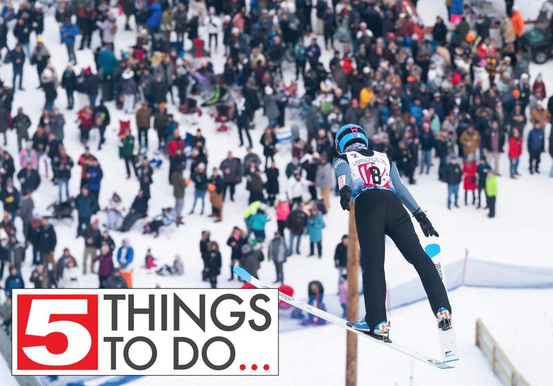 The annual Norge Winter Ski Jump Tournament returns this weekend. In this 2022 file photo from last year's competition, Sandra Sproch, with the Norge Ski Club, soars high above the crowd.