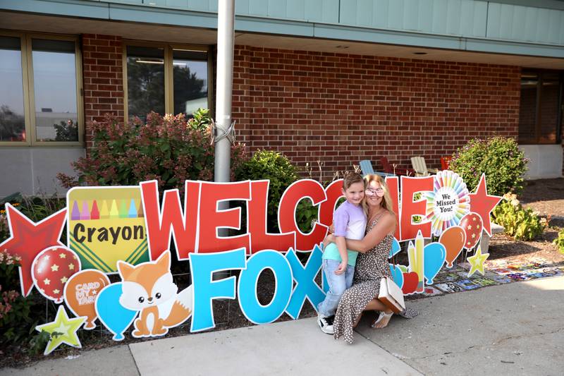 Stephanie Malinski poses for a photo with her son, Colton, on his first day of first grade at Fox Ridge Elementary School in St. Charles on Wednesday, Aug. 14, 2024.