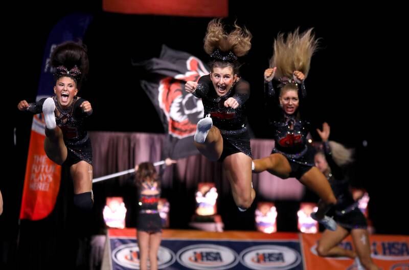 Members of the Crystal Lake Central cheerleading team compete in the medium team division of the IHSA State Finals on Saturday, Feb. 8, 2025 at Grossinger Motors Arena in Bloomington.