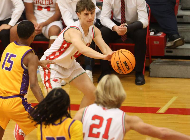 L-P's Joey Gallicchio passes the ball inside the lane to Mason Morscheiser on Friday, Dec. 19, 2025 in Sellett Gymnasium at L-P High School.