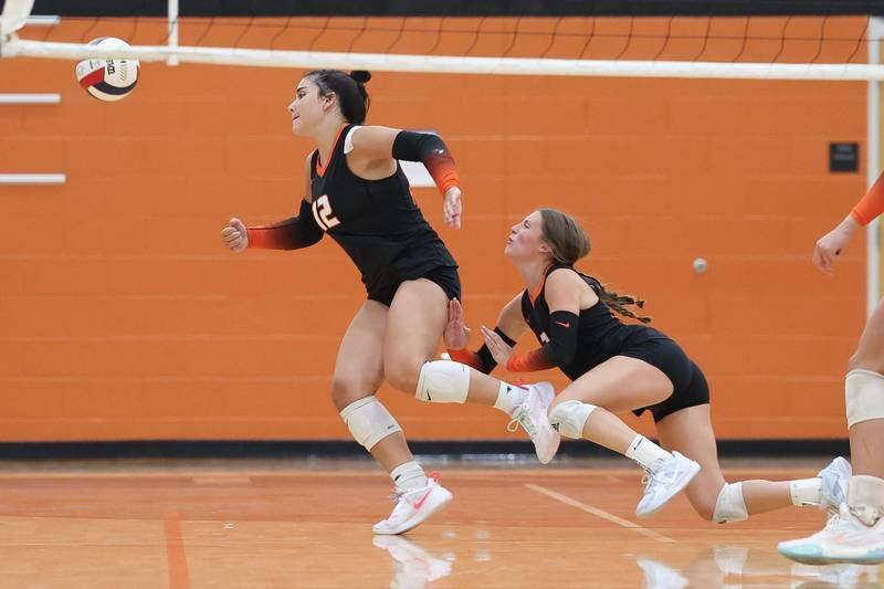 Minooka’s Kiera Cundari, left, and Kennedy Walker chase down the ball against Joliet Catholic on Wednesday, Sept. 4, 2024 in Minooka.