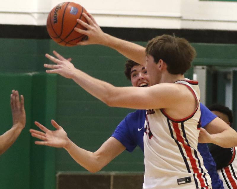 Burlington Central's Myles Lowe tries to block the pass of Huntley's Ethan Blackmore during the boy’s game of McHenry County Area All-Star Basketball Extravaganza on Sunday, April 14, 2024, at Alden-Hebron’s Tigard Gymnasium in Hebron.
