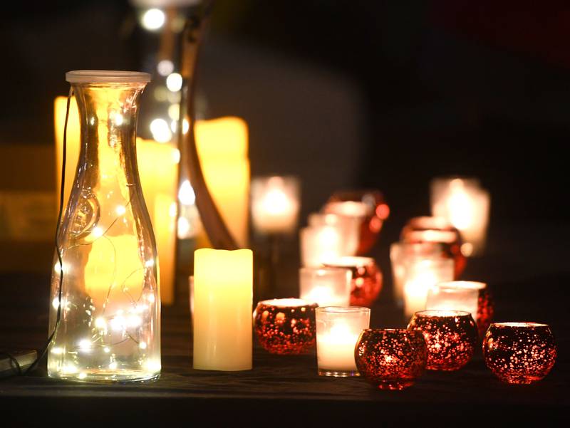 Candles sit on a table during a Friday, Jan. 9, 2026 candlelight vigil in Oregon for Renee Nicole Good, the Minnesota woman who was shot and killed during an Immigration and Customs Enforcement (ICE) operation Jan. 7 in Minneapolis.