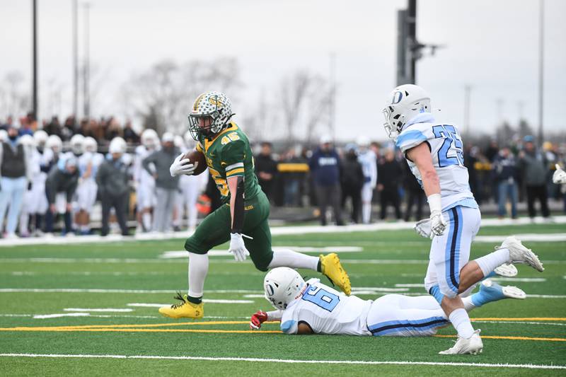 Coal City's Landin Benson avoids a tackle by DePaul's Avry Bellis en route to a touchdown Saturday, Nov. 23, 2024, during the Coalers' 21-14 loss to the Rams in the IHSA Class 4A Playoffs semifinal game.