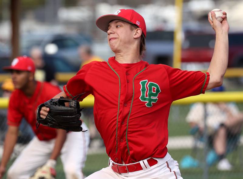 La Salle-Peru's Gavin Kallis delivers a pitch Wednesday, April 23, 2025, during their game against Sycamore at the Sycamore Community Sports Complex.