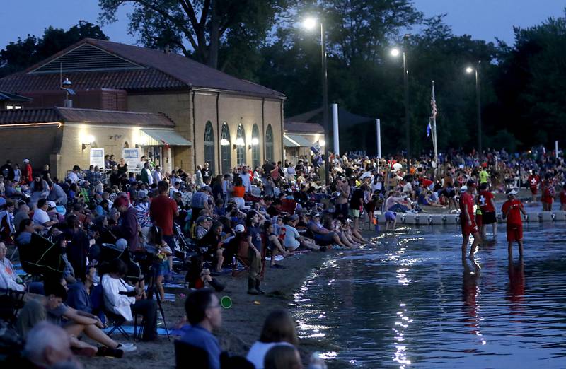 People line Crystal Lake’s Main Beach for the  fireworks show Sunday, July 2, 2023, at beach during Crystal Lake Annual Independence Day Celebration.