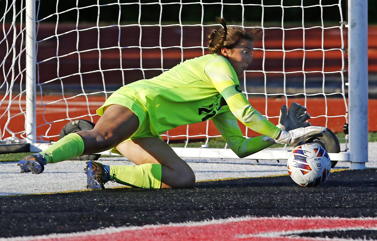 Crystal Lake Central's Addison Cleary stops aLake Forest shootout kick during a Class 2A Deerfield Sectional semi-final match on Tuesday, May 21, 2024, at Deerfield High School.
