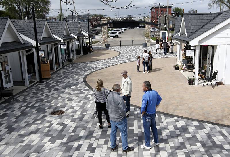 People shop on Friday, May 2, 2025, at the McHenry Riverwalk Shoppes on the first day of the 2025 season.