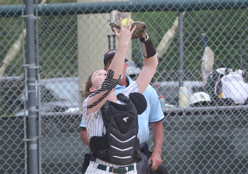 St. Bede catcher Lili McClain makes a catch behind home plate against Seneca on Monday, May 12, 2025 at St. Bede Academy.