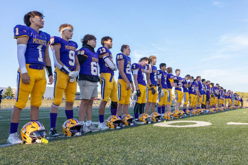 The Mendota High School football team lines up across the field in preparation for the National Anthem prior to the start of the game at The Jeff Prusator Athletic Complex on September 5, 2025 at Mendota High School.