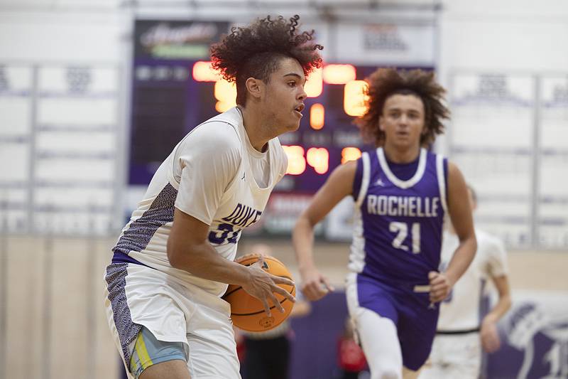 Dixon’s Darius Harrington heads for the hoop against Rochelle Monday, Dec. 9, 2024, at Dixon High School.