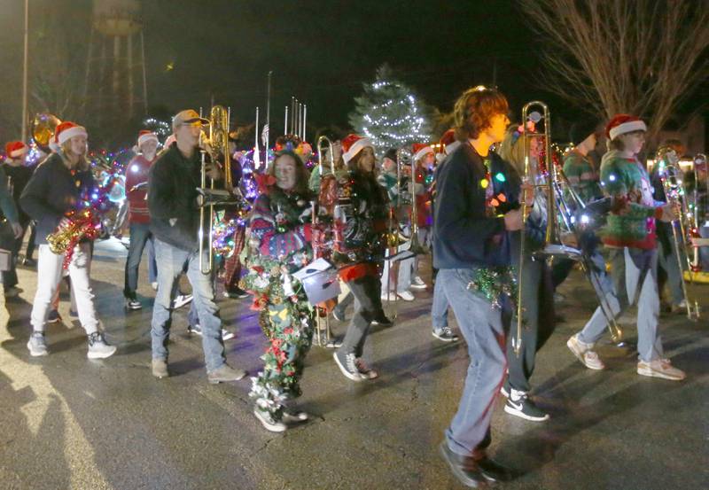 Members of the Princeton High School Marching Band perform in the inaugural Lighted Christmas Parade on Friday, Dec. 1, 2023 in Princeton.