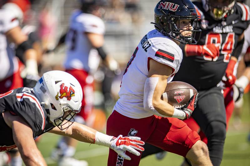 NIU receiver Kacper Rutkiewicz picks up some extra yards for the Huskies against Ball State on Saturday, October 1, 2022.