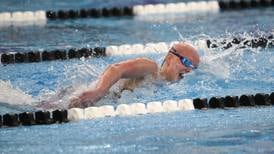 Photos: State swim preliminaries