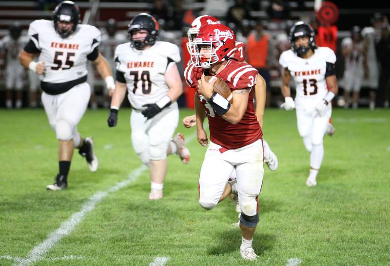 Hall's Aiden Redcliff runs with the ball against Kewanee on Friday, Sept. 27, 2024 at Richard Nesti Stadium.