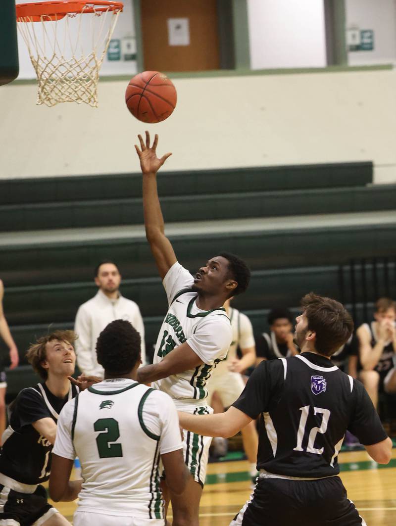 Kishwaukee College's Carron Gibson shoots in front of Rockford University's Joseph Richbourg Thursday, Jan. 22, 2026, during their game at Kishwaukee College in Malta.