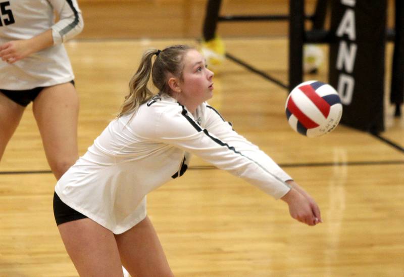 Kaneland’s Carmella Rio bumps the ball during a home game against Morris on Thursday, Oct. 13, 2022.