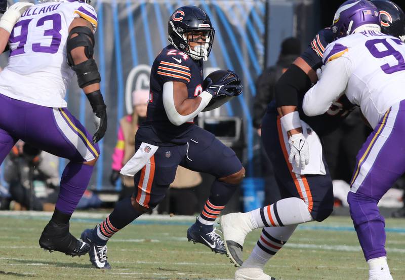 Chicago Bears running back Khalil Herbert finds some running room in the Vikings defense Sunday, Jan. 8, 2023, during their game at Soldier Field in Chicago.