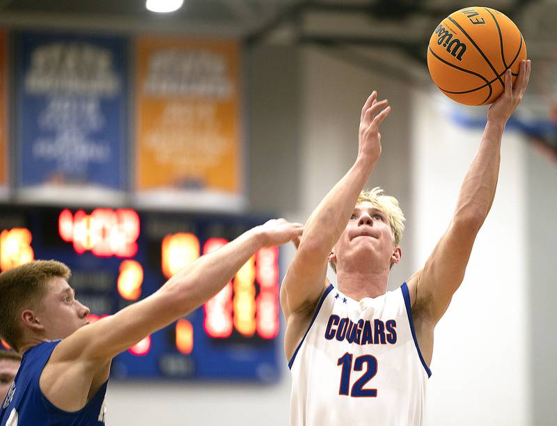 Eastland’s Adam Awender puts up a shot against Newman Tuesday, Dec. 10, 2024, at Eastland High School.
