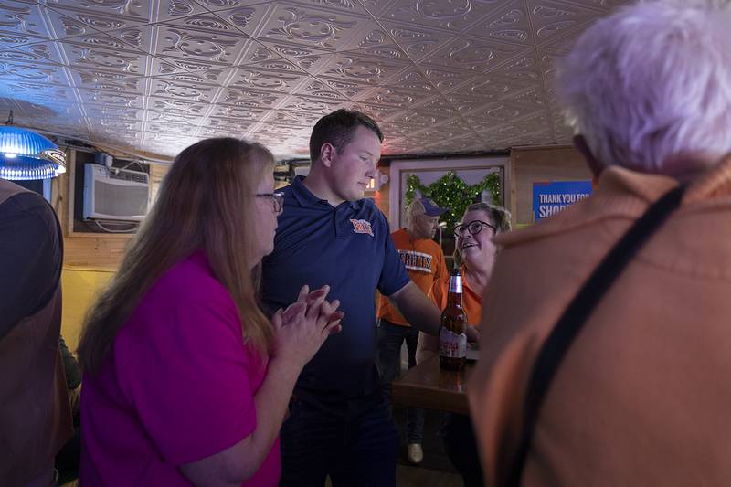Celebrating with a watch party at the Shamrock in Dixon, 74th district incumbent Brad Fritts watches the numbers Tuesday, Nov. 5, 2024.