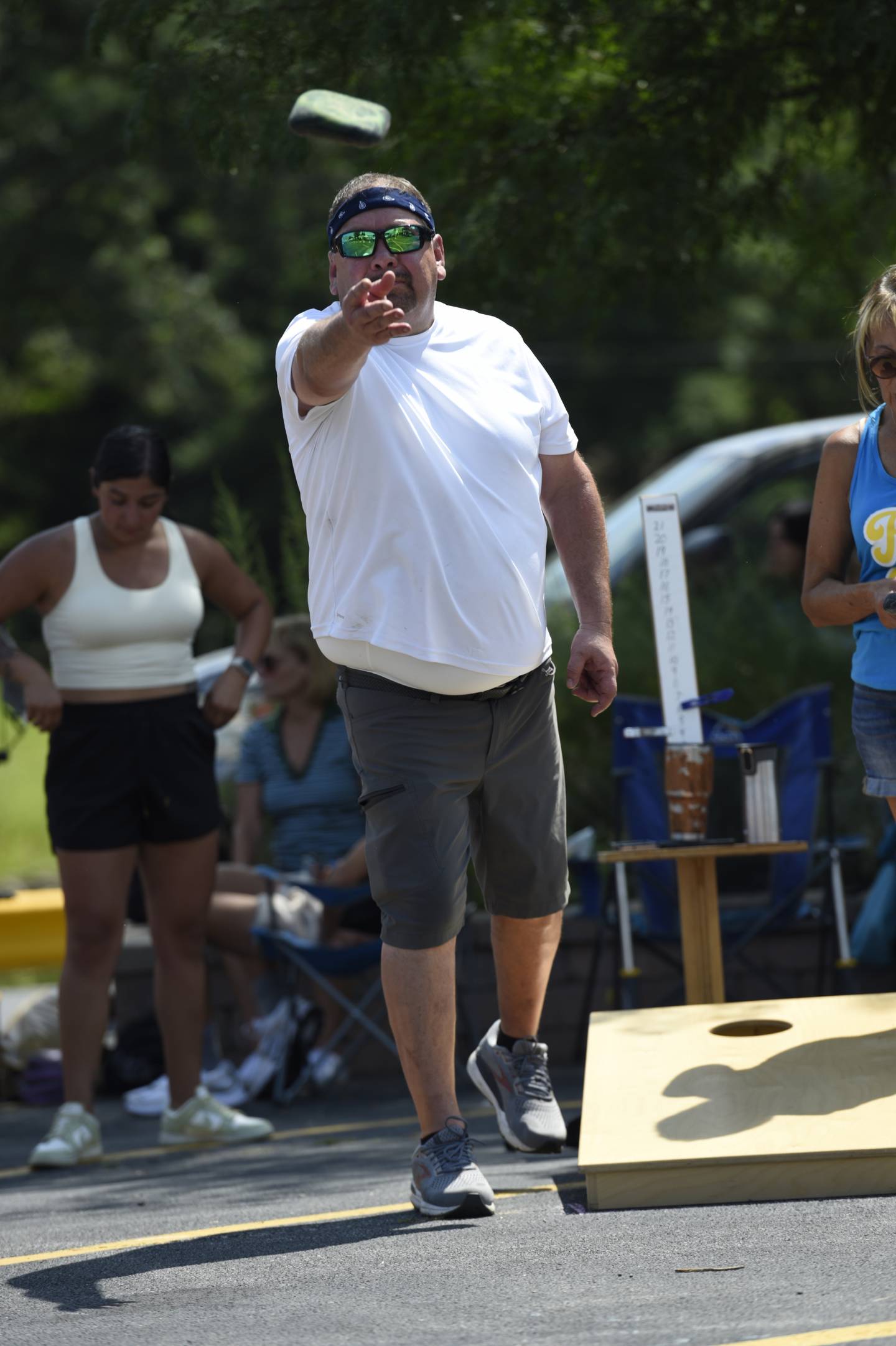 John Lopez, a Glad Fest organizer of Momence, competes in the cornhole tournament in Momence on Sunday, Aug. 10, 2025. The tournament was the largest of it's kind for the area with 162 participants.