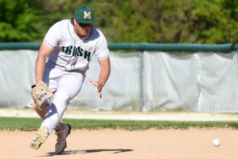 Bishop McNamara's Max Rohr fields a ground ball during a game at Kankakee Friday, May 9, 2025.