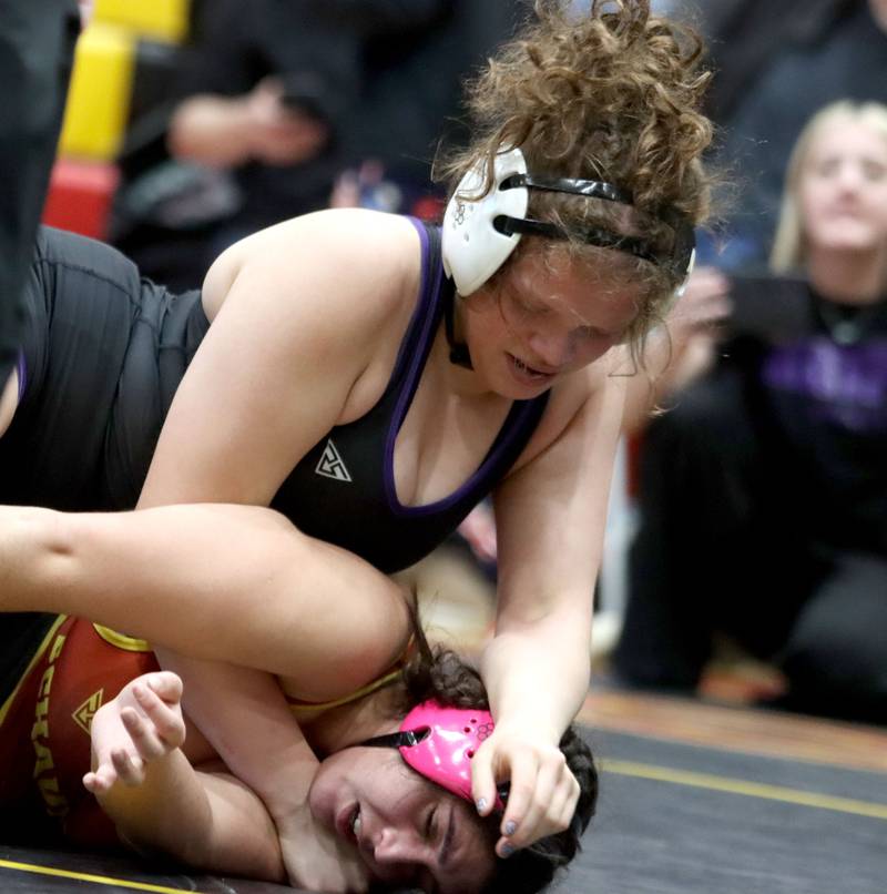Hampshire’s Samantha Diehl, top, battles Schaumburg’s Nadia Razzak at 190 pounds in the title bout of varsity girls IHSA Sectional wrestling on Saturday, February 14, 2026, at Schaumburg High School in Schaumburg.