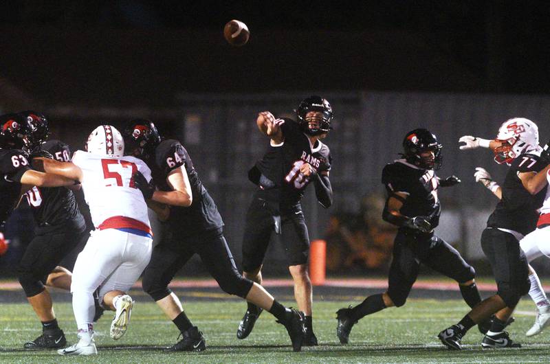 Glenbard East quarterback Blake Salvino (10) makes a pass during Friday’s football game against South Elgin in Lombard.