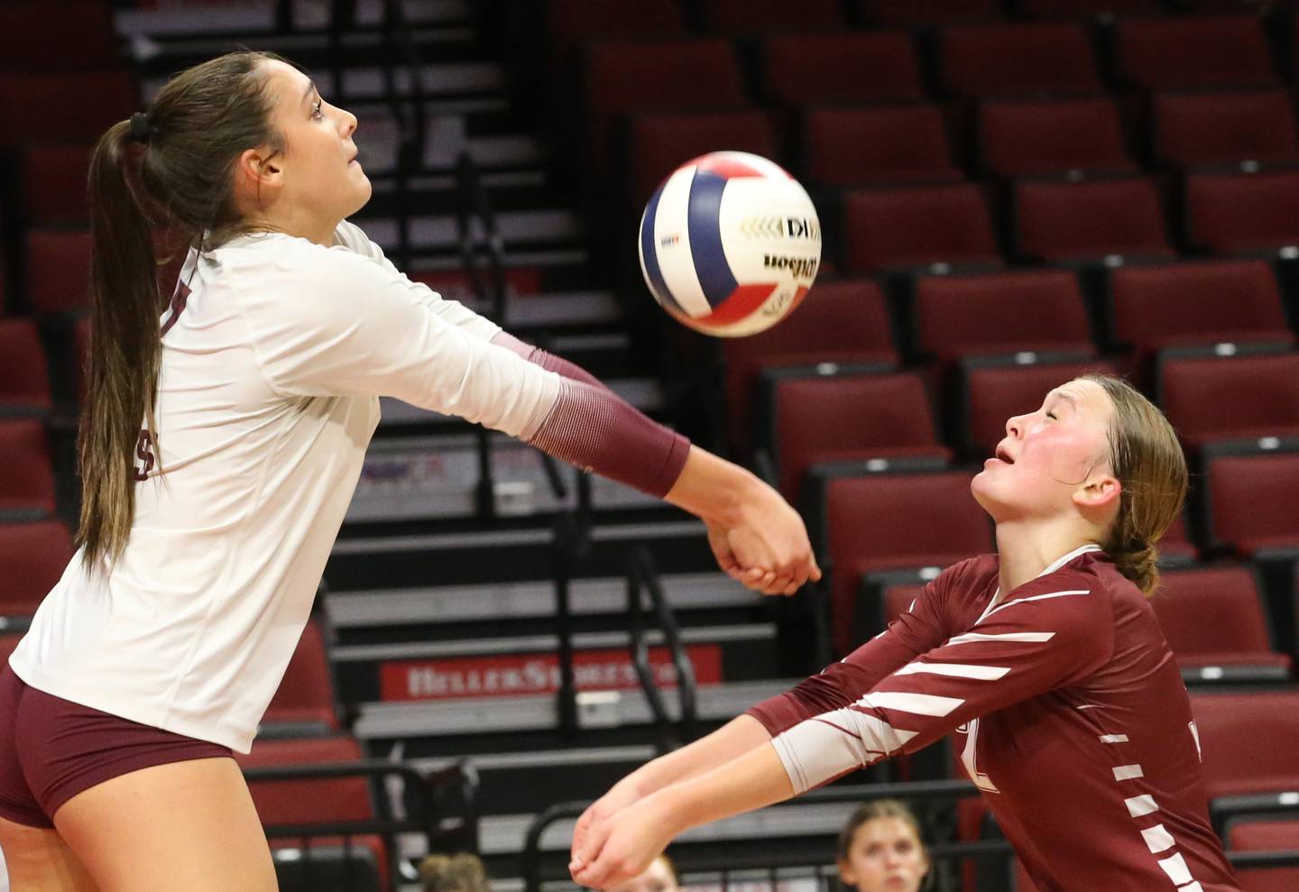 Prairie Ridge's Julie Reina sends a returned serve to Limestone as teammate Allison Rogers looks on during the Class 3A State semifinal game on Friday, Nov. 15, 2024 at CEFCU Arena in Normal.