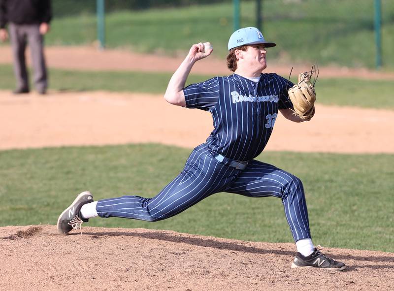 Nazareth's Finn O'Meara (32) pitches during the varsity baseball game between Benet Academy and Nazareth Academy in La Grange Park on Monday, April 24, 2023.