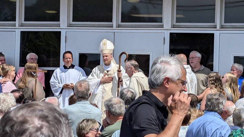 Bishop Ronald A. Hicks gives a final blessing to attendees at the final Mass at St. Bernard Catholic Church on Saturday, June 22, 2024, in Joliet.