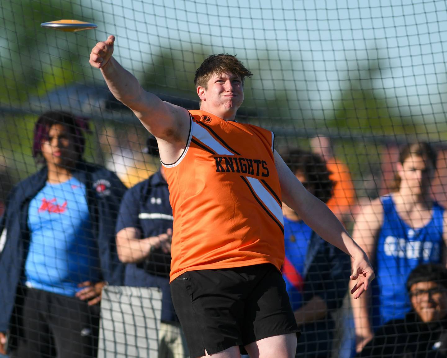 Brady Betustak competes on the disc finals during the Kane County track and field meet held at Marmion Academy in Aurora on Friday May 3, 2024.