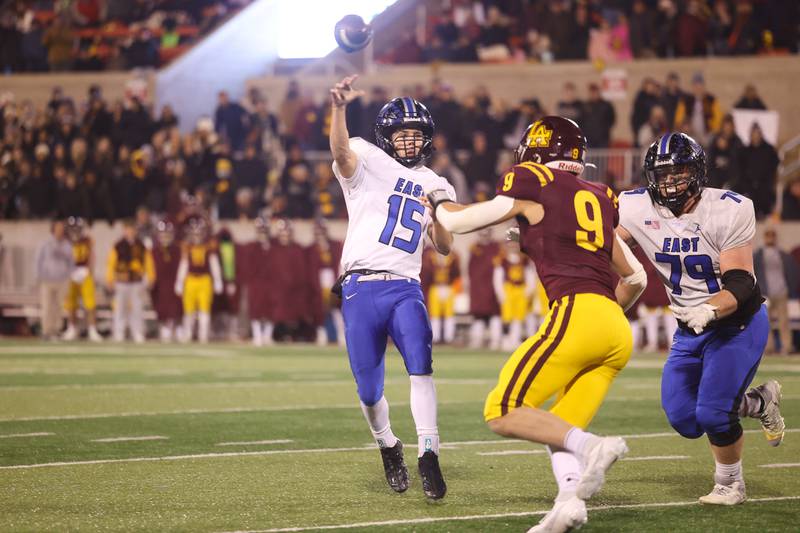 Lincoln-Way East’s Braden Tischer lobs a pass for a touchdown against Loyola in the Class 8A championship on Saturday, Nov. 25, 2023 at Hancock Stadium in Normal.