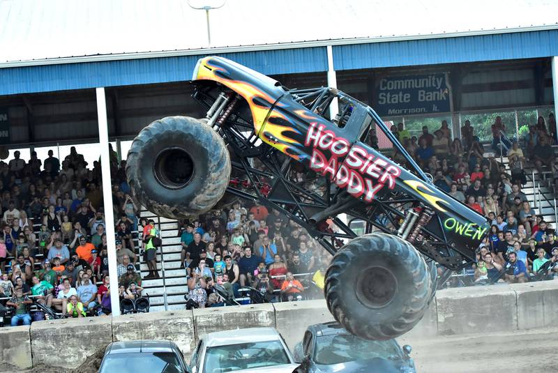 Full Throttle Monster Trucks took it to the Whiteside County Fair on Thursday, Aug. 14, 2025, in Morrison. Chris Rogers, the driver of Hoosier Daddy, performed gravity-defying tricks in front of a packed grandstand.