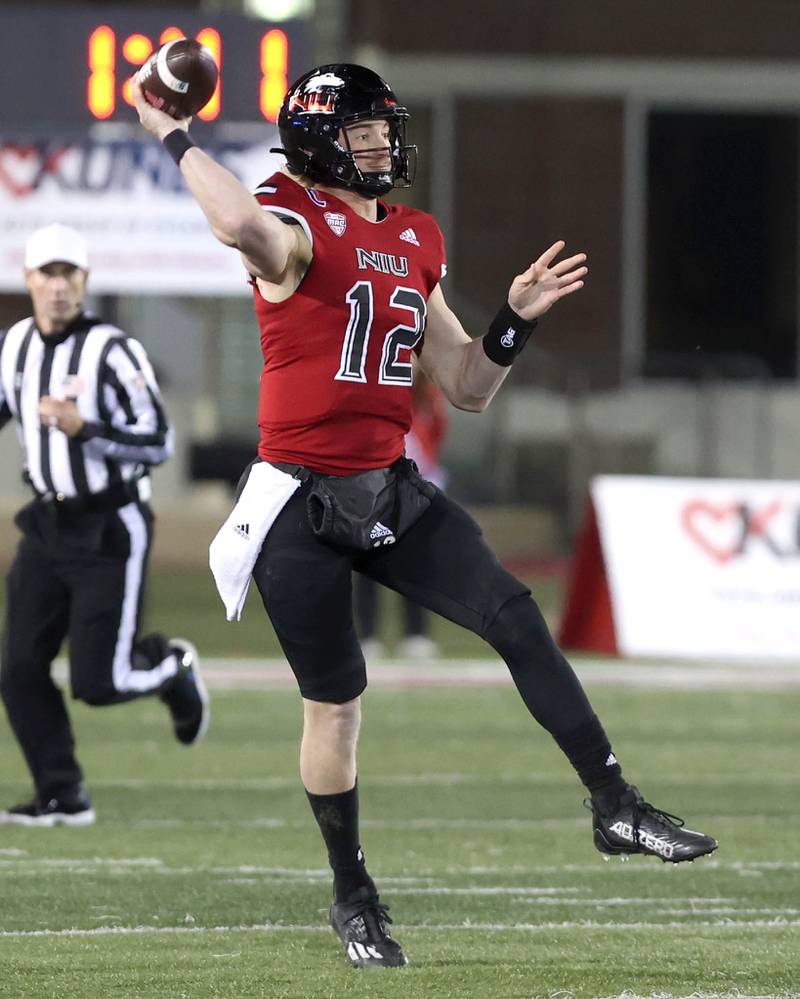 Northern Illinois' Rocky Lombardi throws on the run during their game against Western Michigan Tuesday, Nov. 14, 2023, in Huskie Stadium at NIU in DeKalb.