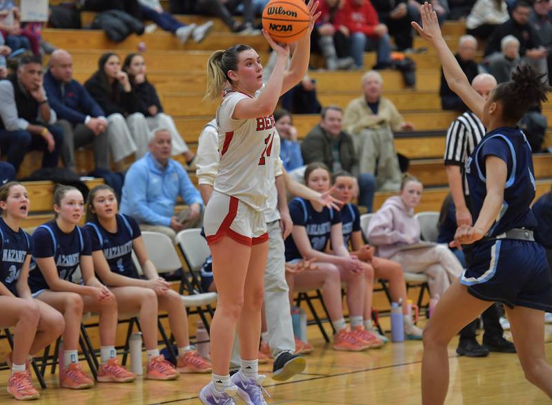 Benet’s Lucy Tierney shoots a three pointer as Nazareth’s Mia Gage defends during a game on January 28, 2026 at Benet Academy in Lisle.