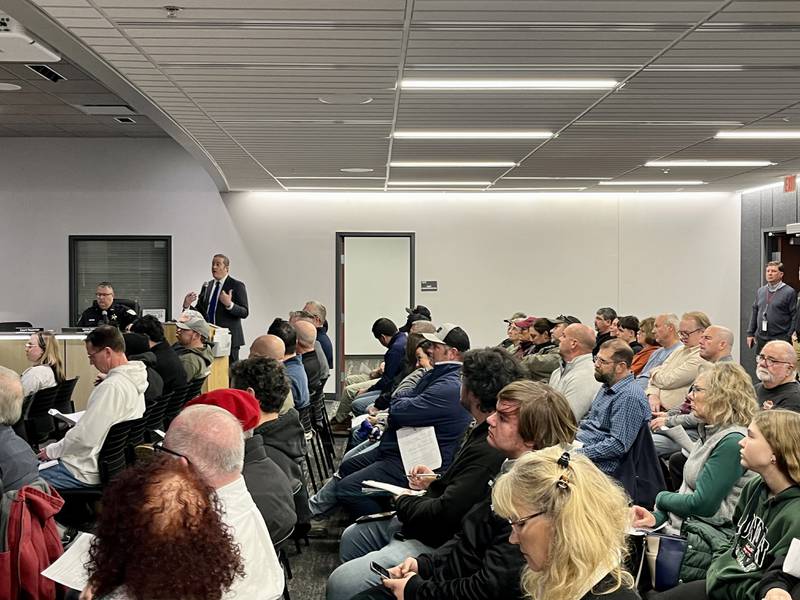 Yorkville city administrator Bart Olson sells the benefits of data center tax revenue to a packed crowd during the city council meeting on Nov. 10, 2025.