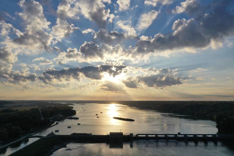 The sun rises over the Illinois River on Tuesday, Oct. 24, 2023 at the Starved Rock Lock and Dam.