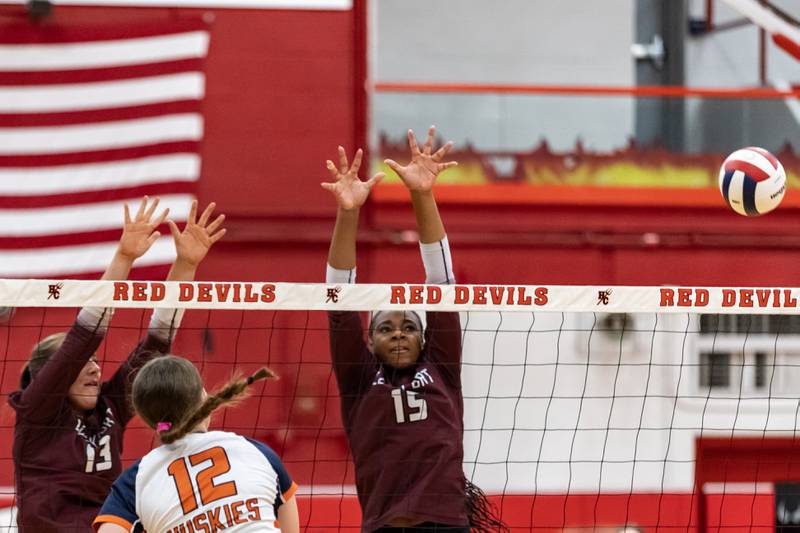 Lockport's Olivia Maier and attempt to block a hit from Oak Park-River Forest's Emmi Bozarth during a 4A Supersectional girls volleyball game at Hinsdale Central on Nov. 10, 2025.