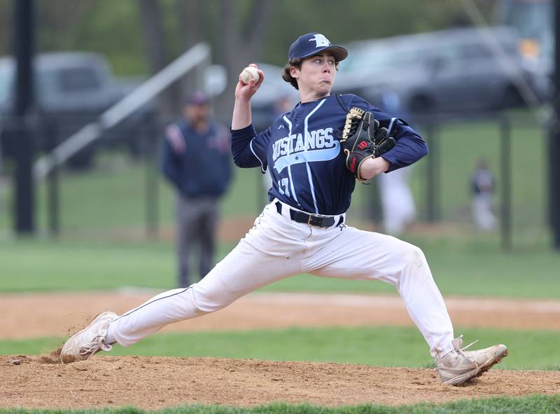 Downers Grove South's Wyatt Wawro (27) pitches during the varsity baseball game between Downers Grove South and Downers Grove North in Downers Grove on Saturday, April 29, 2023.
