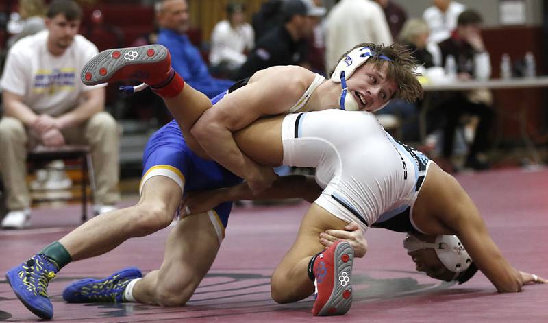 Johnsburg’s Landon Johnson there to take down Marian Central’s Andrew Alvarado in the 138-pound championship match of the IHSA 1A Marengo Wrestling Regional on Saturday, Feb. 8, 2025, at Marengo High School.