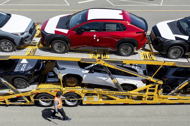 Cars rest on a carrier at the BNSF Railway vehicle storage facility at the Port of Richmond on Thursday, April 3, 2025, in Richmond, Calif. (AP Photo/Noah Berger)