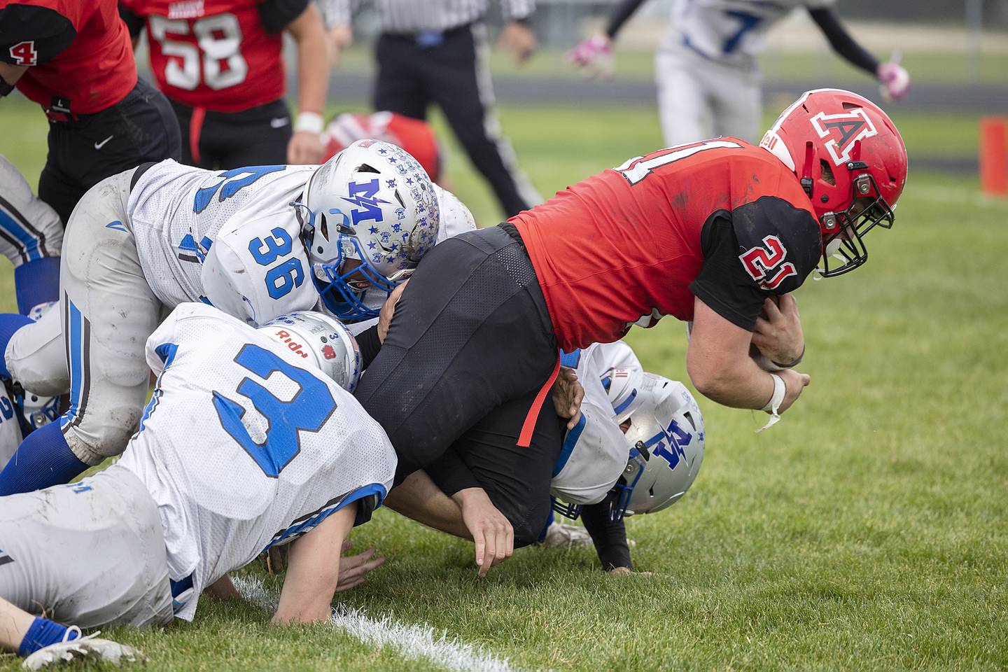 Amboy’s Quinn Leffelman punches it in for a TD against Martinsville Saturday, Nov. 9, 2024, in round two of the 8-man football playoffs.