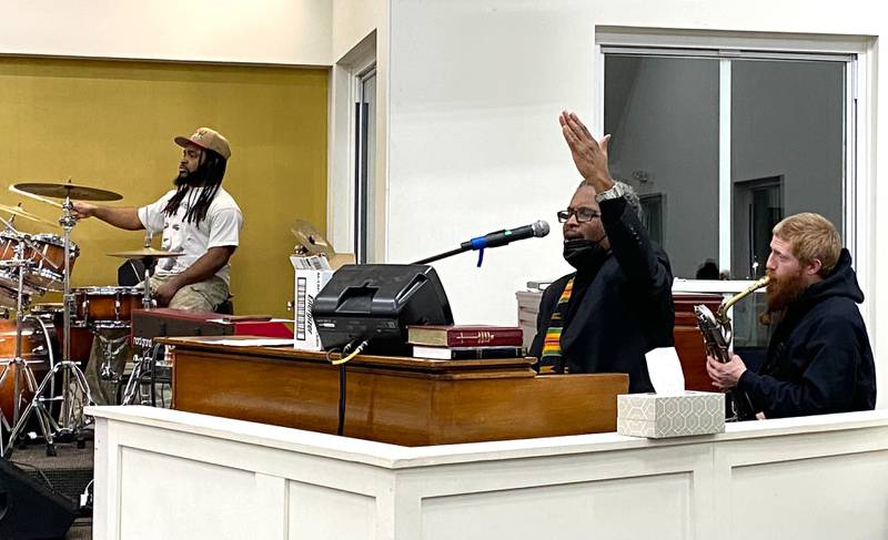 (From left): Billy Evans, Jr., Vincent Bland and Jacob Slocum, perform the hymn "Lift Every Voice and Sing" while the crowd sings along at the annual Martin Luther King, Jr. Celebration event on Monday, Jan. 20, 2025, at New Hope Missionary Baptist Church, 1201 Twombly Road, DeKalb.