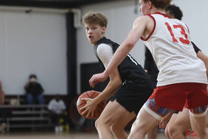A Minooka player looks for a play against Marmion at the 37th Morris Boys Shootout on Tuesday, June 25, 2024.