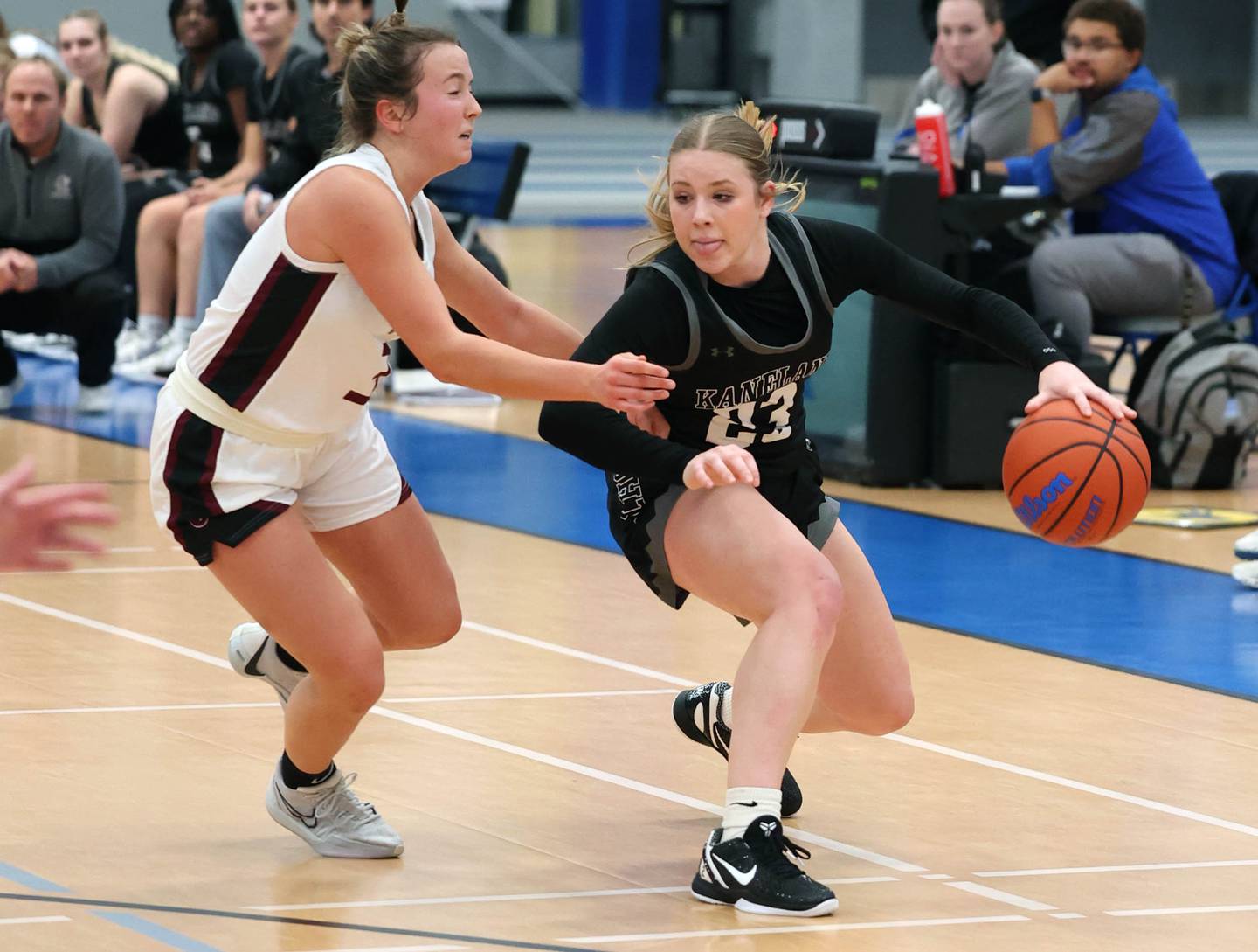Kaneland's Kendra Brown tries to get around Prairie Ridge's Zoe Nanos during their game Friday, Nov. 17, 2023, in the Mark Einwich Varsity Girls Basketball Rockets Kickoff Tournament at Burlington Central High School.