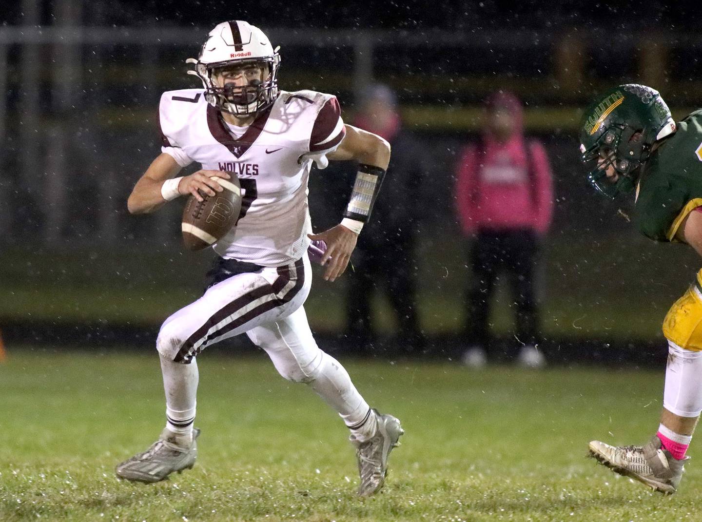Prairie Ridge’s Tyler Vasey scrambles in varsity football action at Ken Bruhn Field on the campus of Crystal Lake South Friday evening.